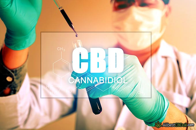 Best CBD oil for cancer: CBD sign and a scientist in the background.