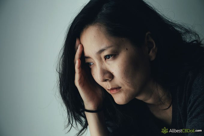 CBC vs CBD: depressed woman