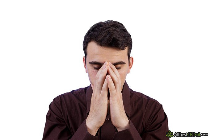 CBD Oil Benefits: a man feeling drowsy CBD Oil Benefits: a man feeling drowsy