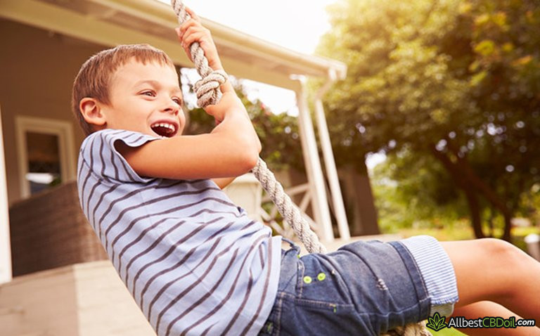 CBD oil for kids: happy child CBD oil for kids: happy child