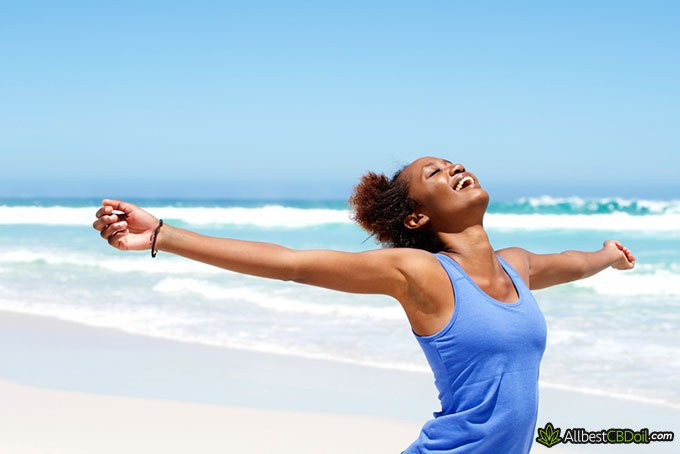 Does CBD get you high: woman is happy after running